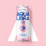 Aqua Libra sparkling water can with pink label on a pink background