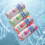 Four cans of Aqua Libra sparkling water on a light blue water background